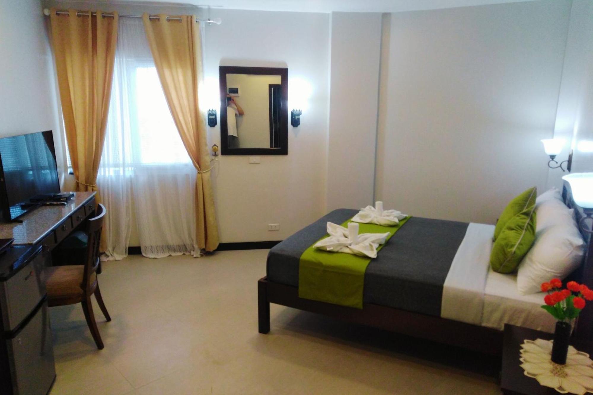 Venezia Suites Hotel Iloilo Kamer foto