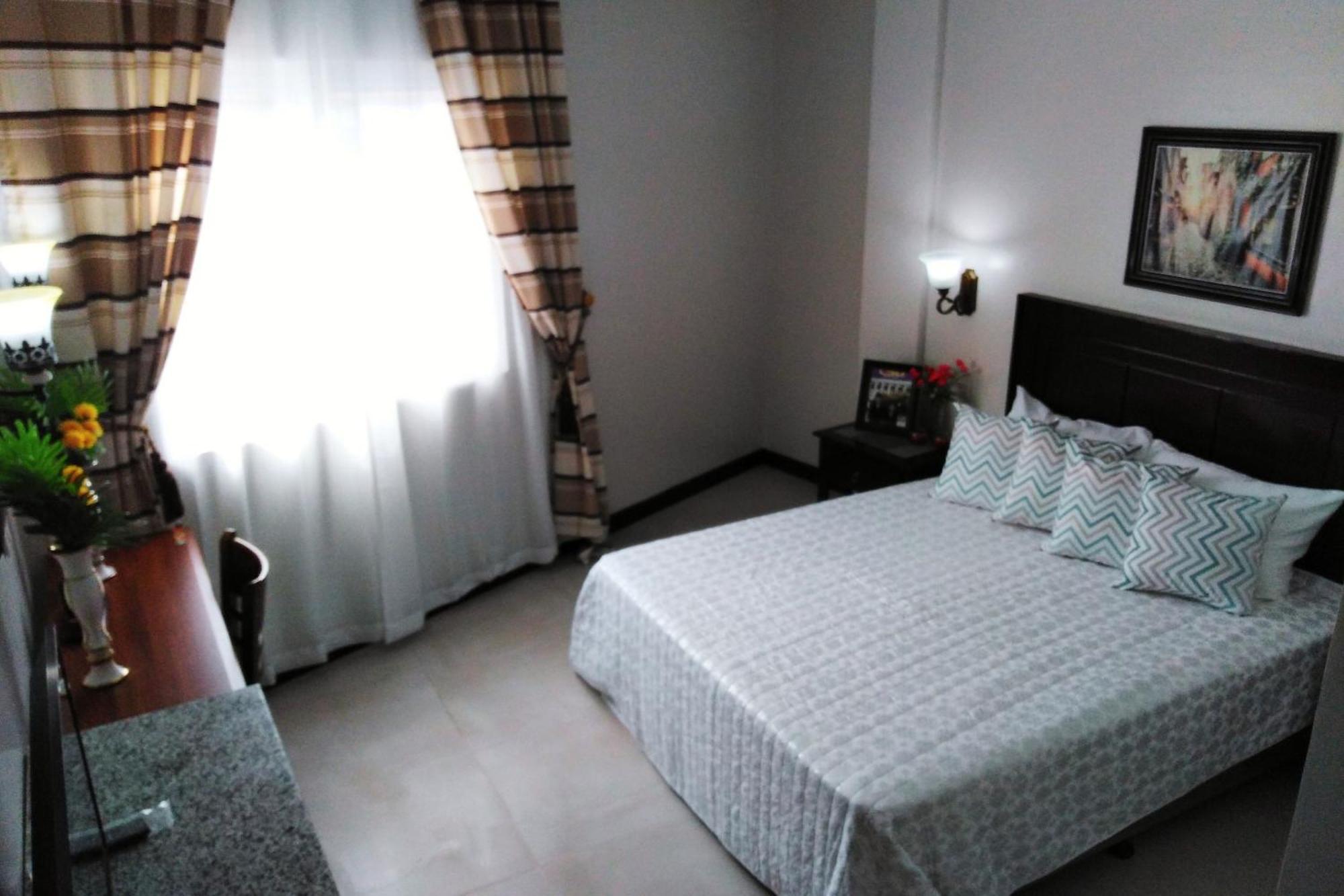 Venezia Suites Hotel Iloilo Kamer foto
