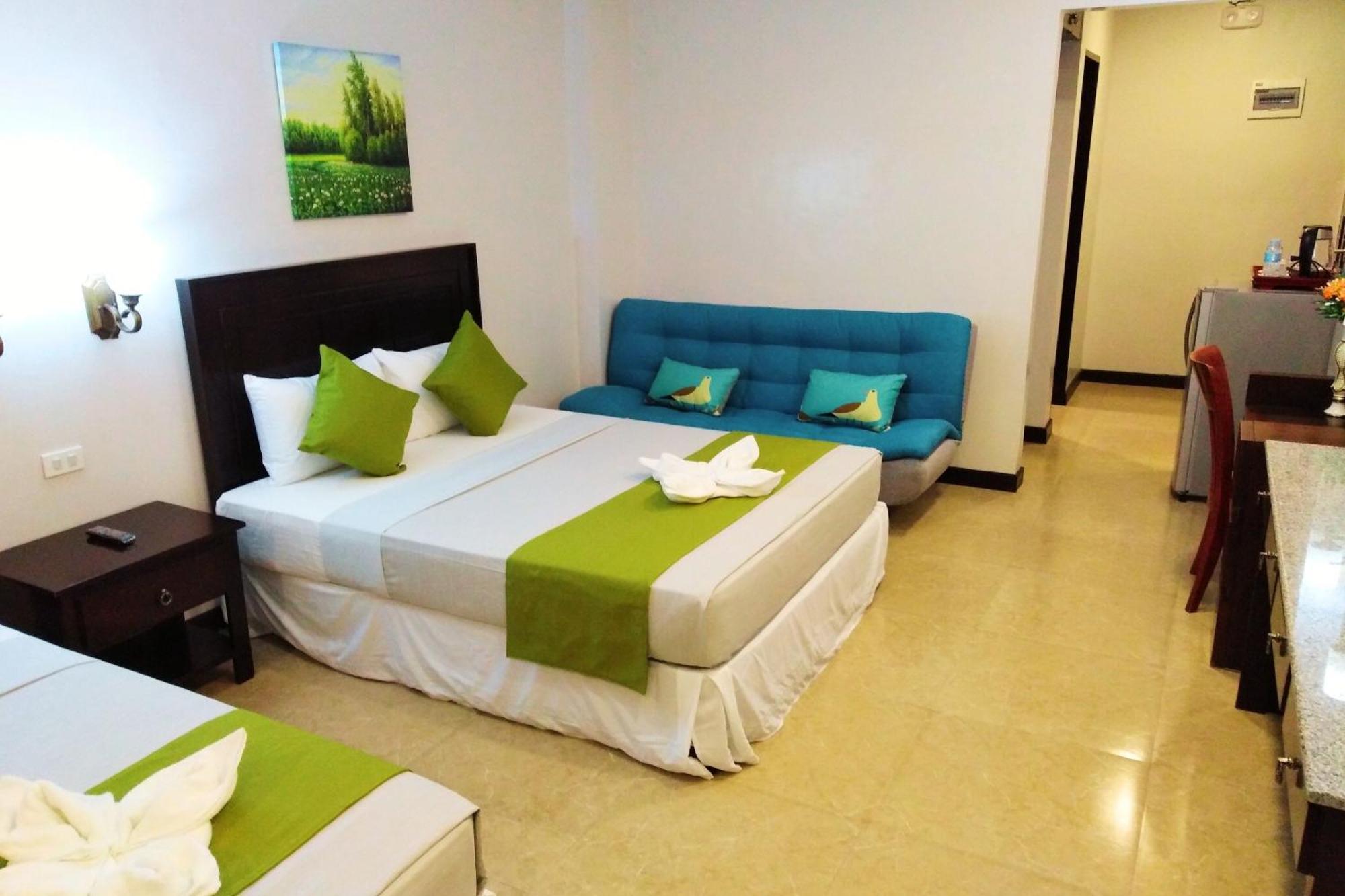 Venezia Suites Hotel Iloilo Kamer foto